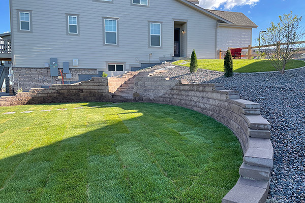Highlands Ranch Landscaping retaining walls and beds for sloped yards